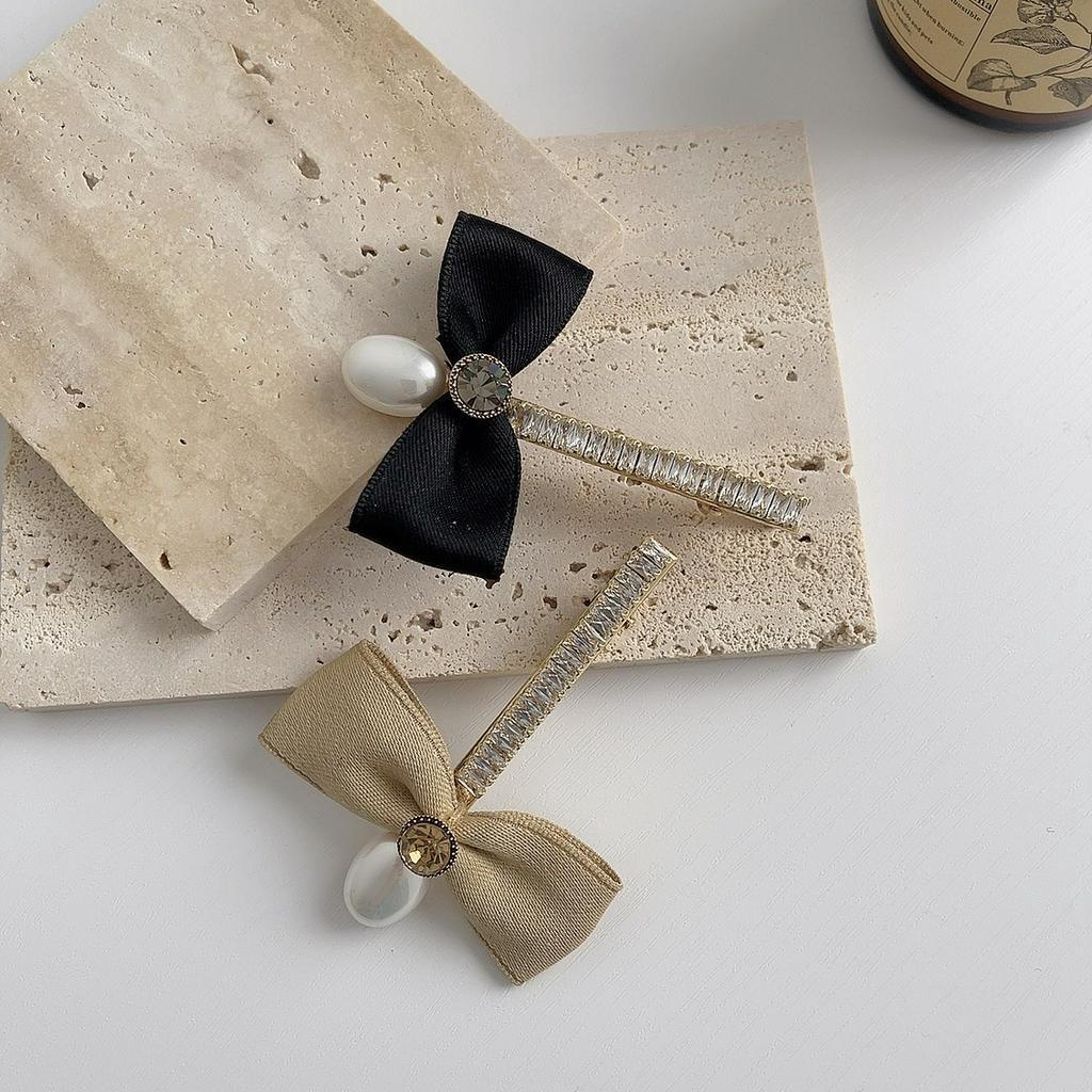 Kẹp tóc nữ hình nơ đính ngọc trai nhân tạo xinh xắn