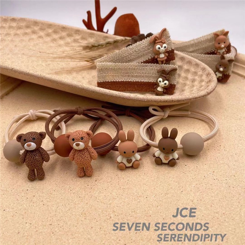 Cột tóc gấu thỏ kèm nhựa tròn xinh CT133