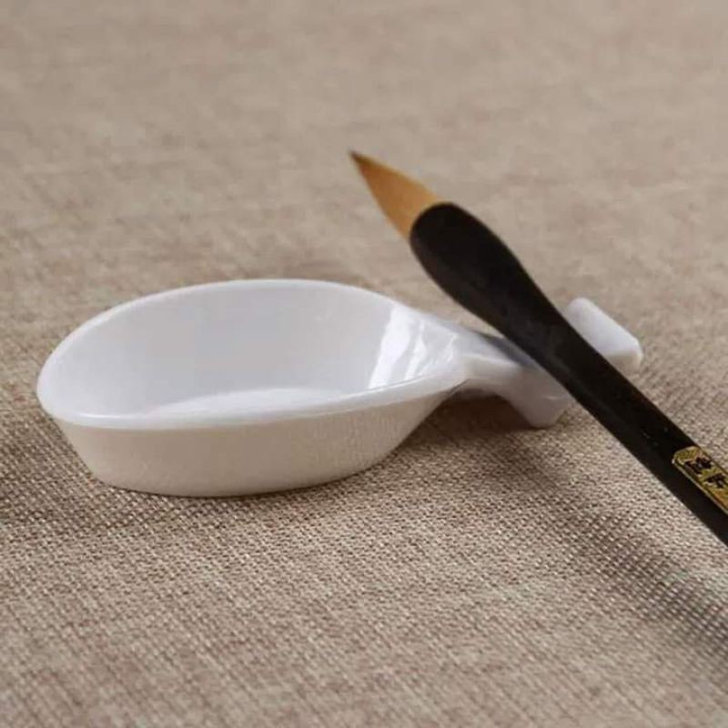 Muỗng nhựa đa đăng,Vừa dựng mực viết vừa làm gác bút