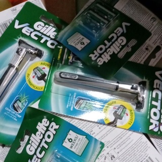 Combo bàn cạo + 2 lưỡi dao Gillette Vector