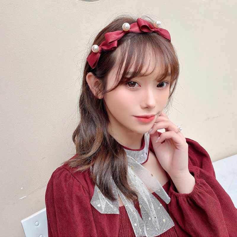 Băng đô cài tóc đính nơ và ngọc trai thời trang Hàn Quốc