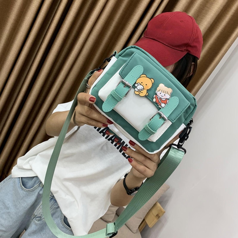 Túi Đeo Chéo Vai Hình Vuông Bằng Nylon Họa Tiết Hoạt Hình Có Thể Điều Chỉnh Kích Thước Cho Nữ