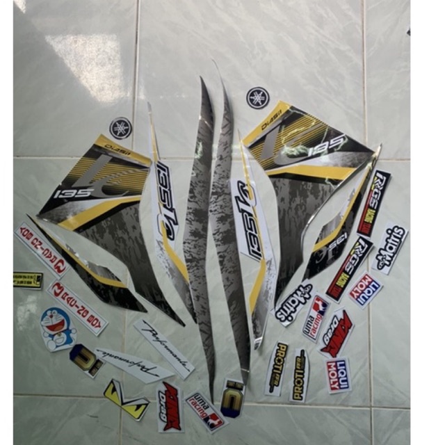 Tem exciter 135 lc v6 vàng đen