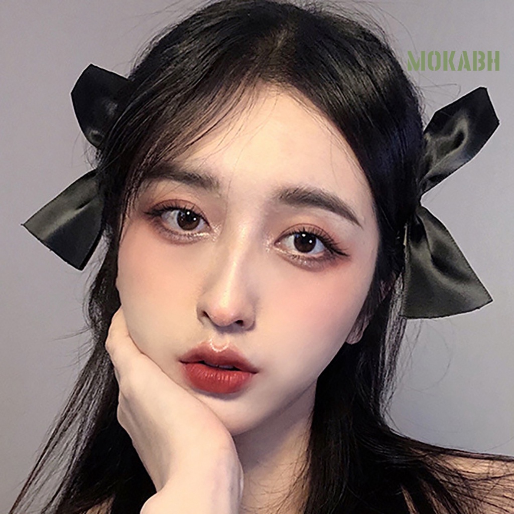 Kẹp Tóc Hình Nơ Co Giãn Màu Trơn Đơn Giản Dành Cho Nữ