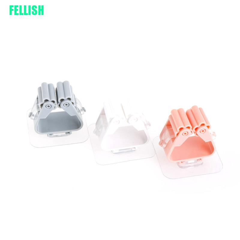 Giá treo cây lau nhà dán tường tiện lợi