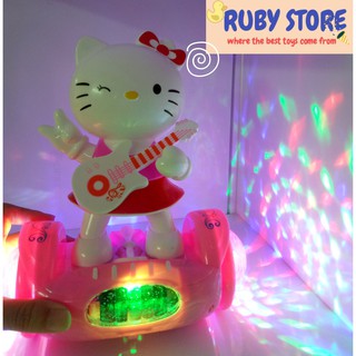 HELLO KITTY TRƯỢT VÁN, CẦM ĐÀN GUITAR, TỰ CHẠY, ĐÈN 3D, NHẠC SÔI ĐỘNG (Dùng pin)