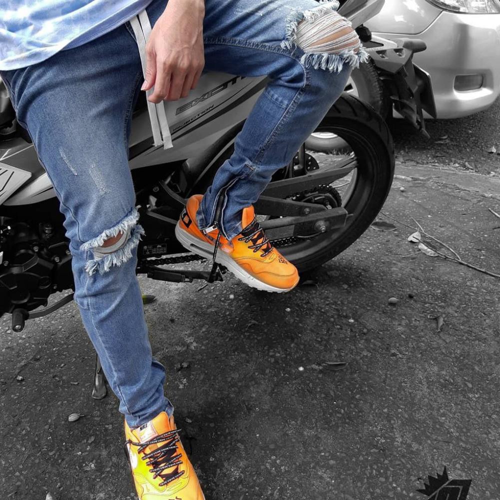 Quần Jeans Nam Xanh Zipper Rách Gối
