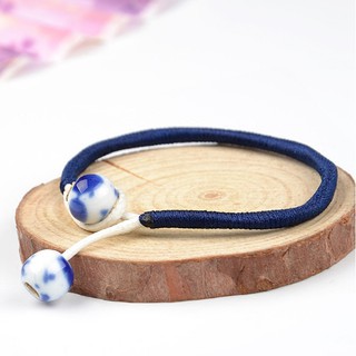 vòng tay khóa gốm sứ đỏ