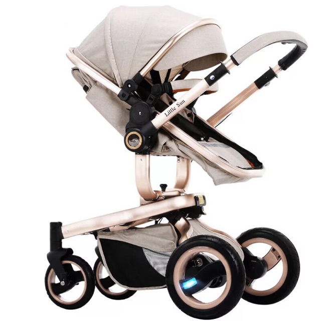Xe đẩy 2 chiều em bé vải da khung vàng sâm panh cao cấp