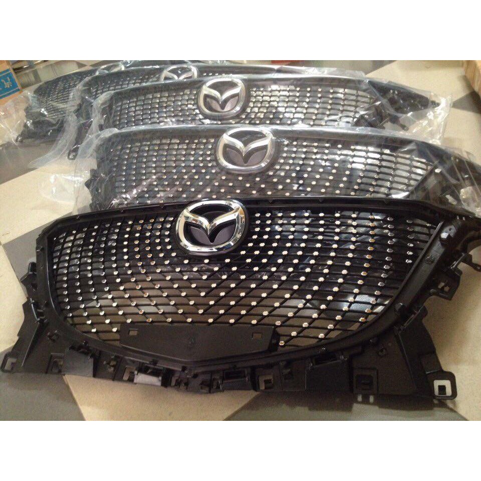 Mặt ca lăng mazda 3 2015 2016 mẫu sao rơi