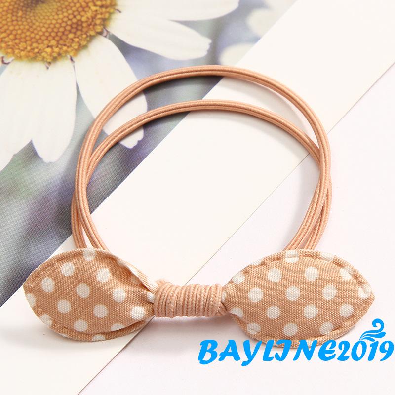 Dây buộc tóc đính nơ họa tiết chấm bi dễ thương cho bé gái