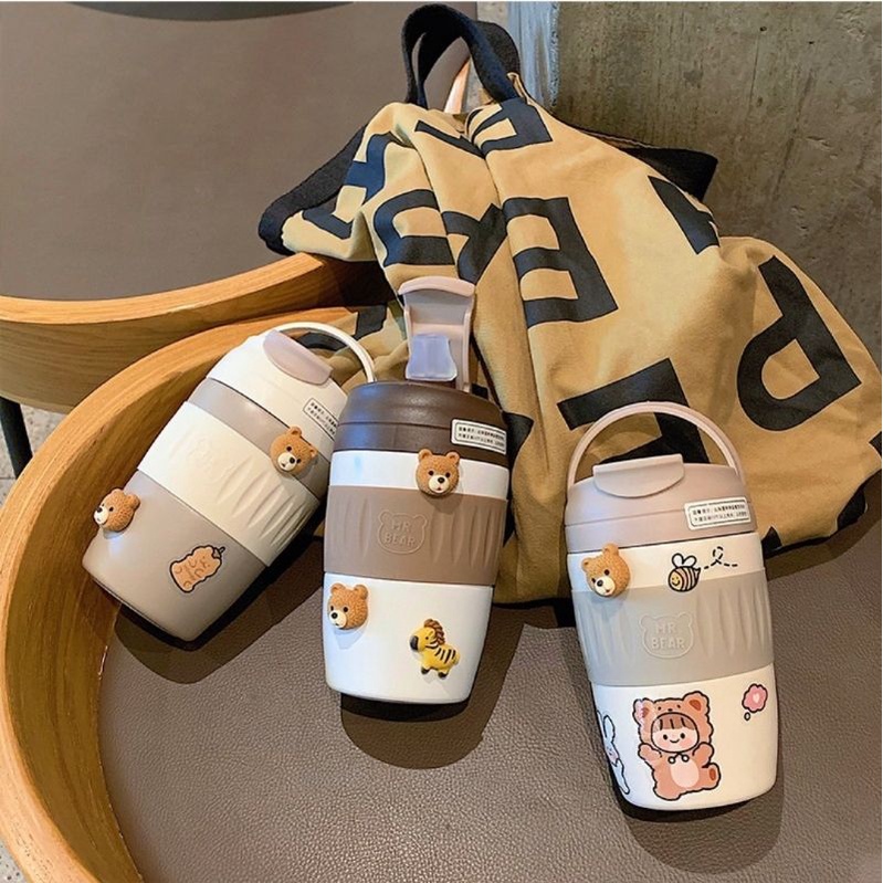 Bình nước gắn sticker siêu cute