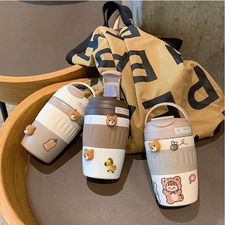 Bình nước gắn sticker siêu cute