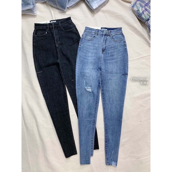 Quần jeans rách lai