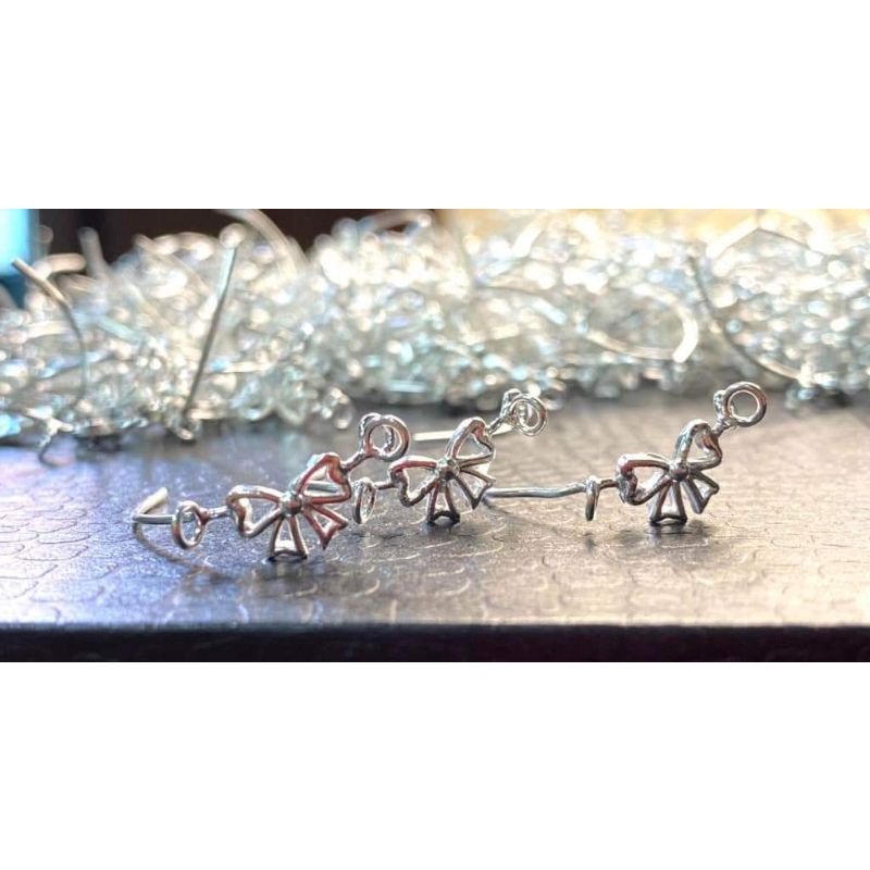 Kẹp nơ móc túi tiền bạc ta làm vòng tay