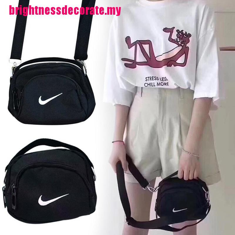 Túi Đeo Chéo Vải Bố In Logo Nike Cho Nữ