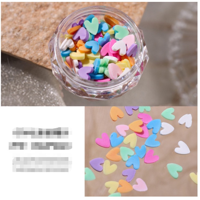 charm tim trang tri nail