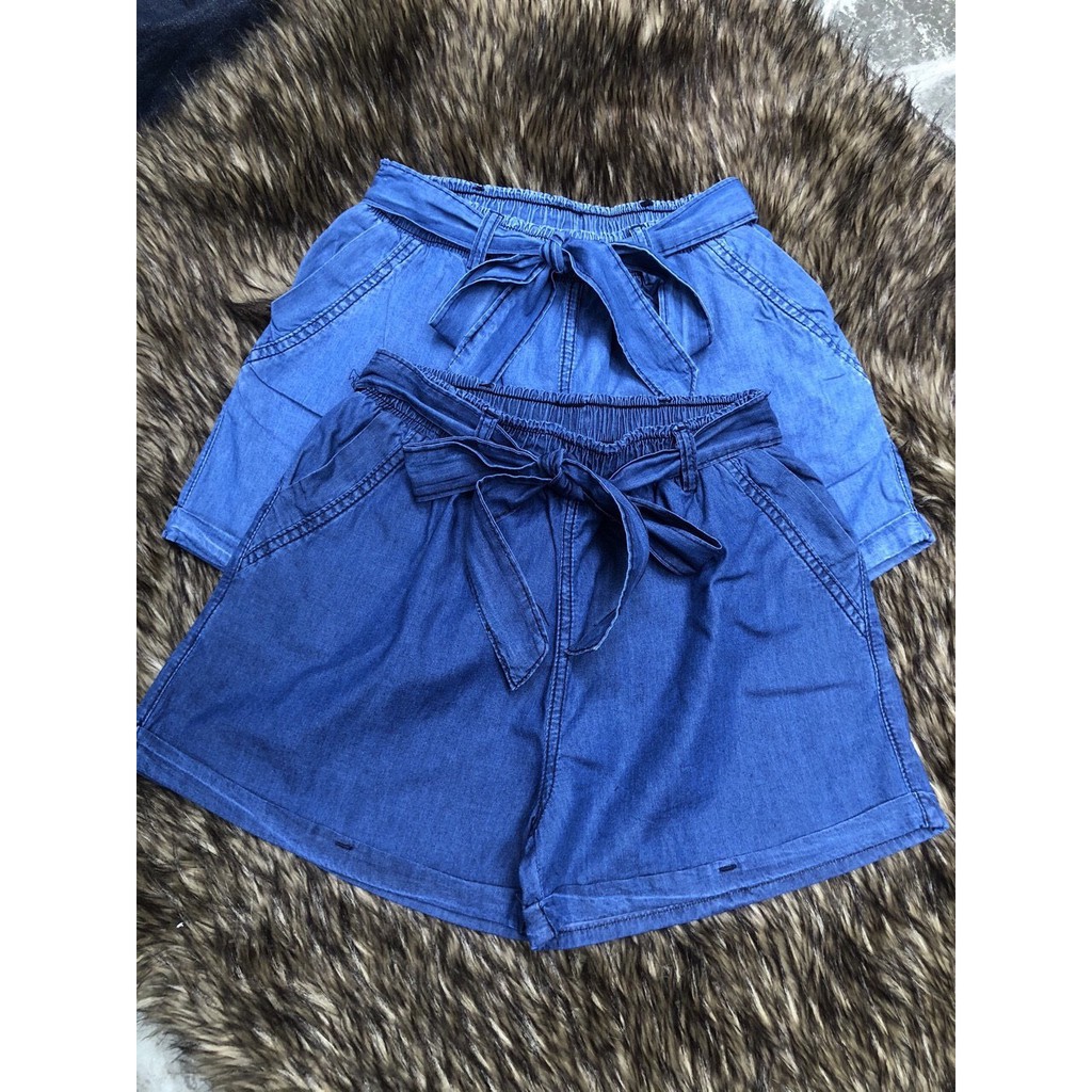 Quần short jean giấy lưng thun thắt nơ