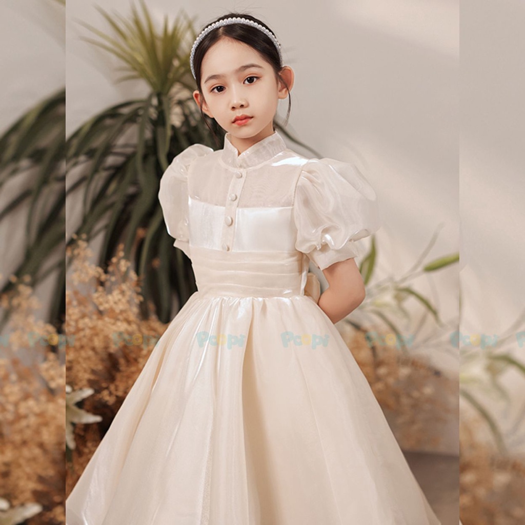Đầm Công Chúa Cho Bé Poopi Dáng Xòe Màu Be Sữa Đính Nơ Lưng, Váy Cho Bé Gái Dự Tiệc Xinh Đẹp