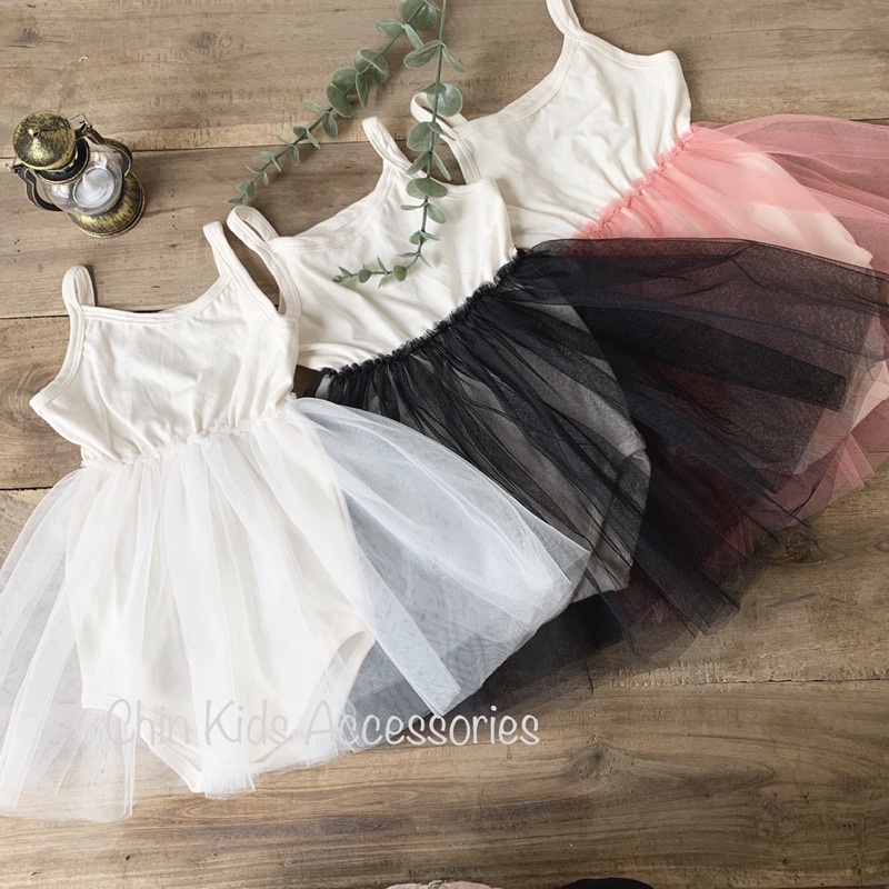 Body váy ren hai dây cotton mềm mại cho bé.