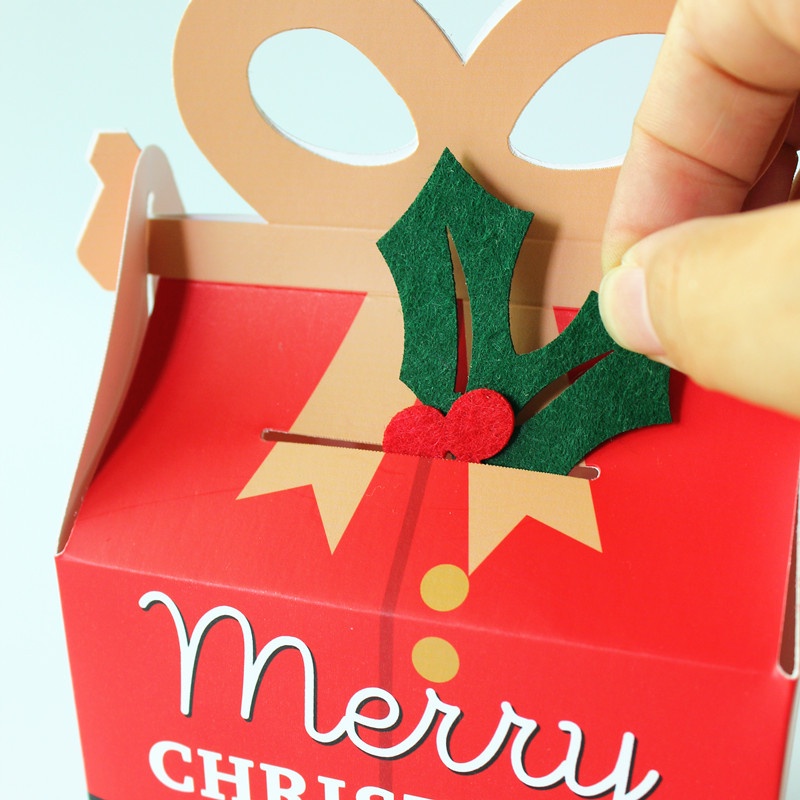 Hộp đựng bánh kẹo in hình ông già Noel trang trí bữa tiệc dịp lễ Giáng Sinh năm mới