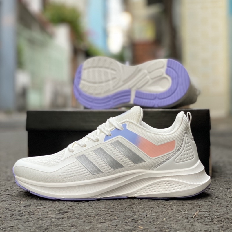 Giày chạy bộ nữ trắng phối tím