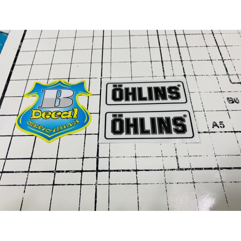 Căp Tem logo Ohlins in decal trong 3x7.5cm