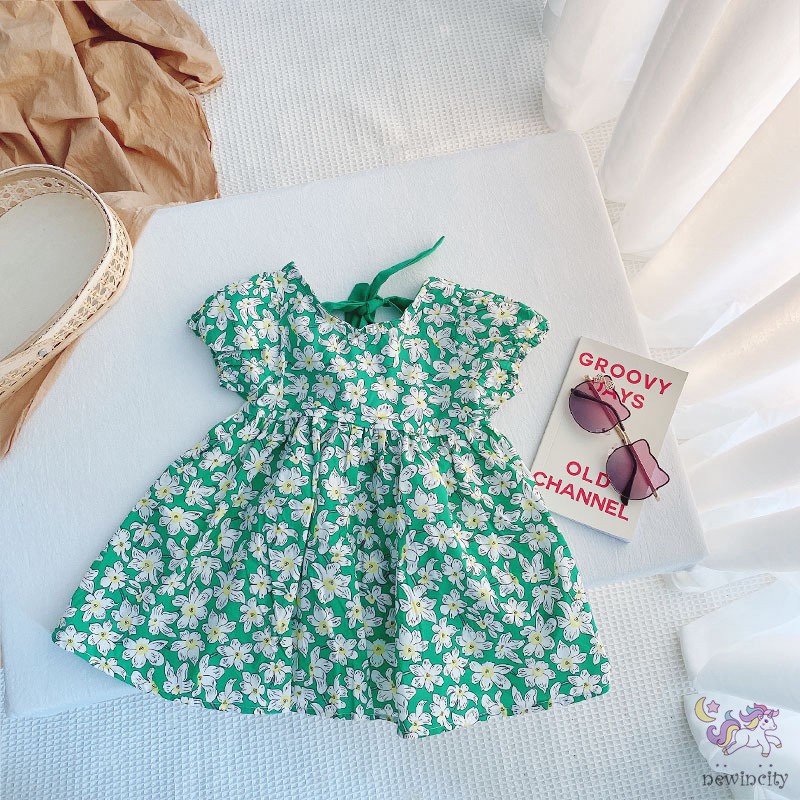 Đầm Hoa Hở Lưng Thắt Nơ Phong Cách Hàn Quốc Cho Bé Gái