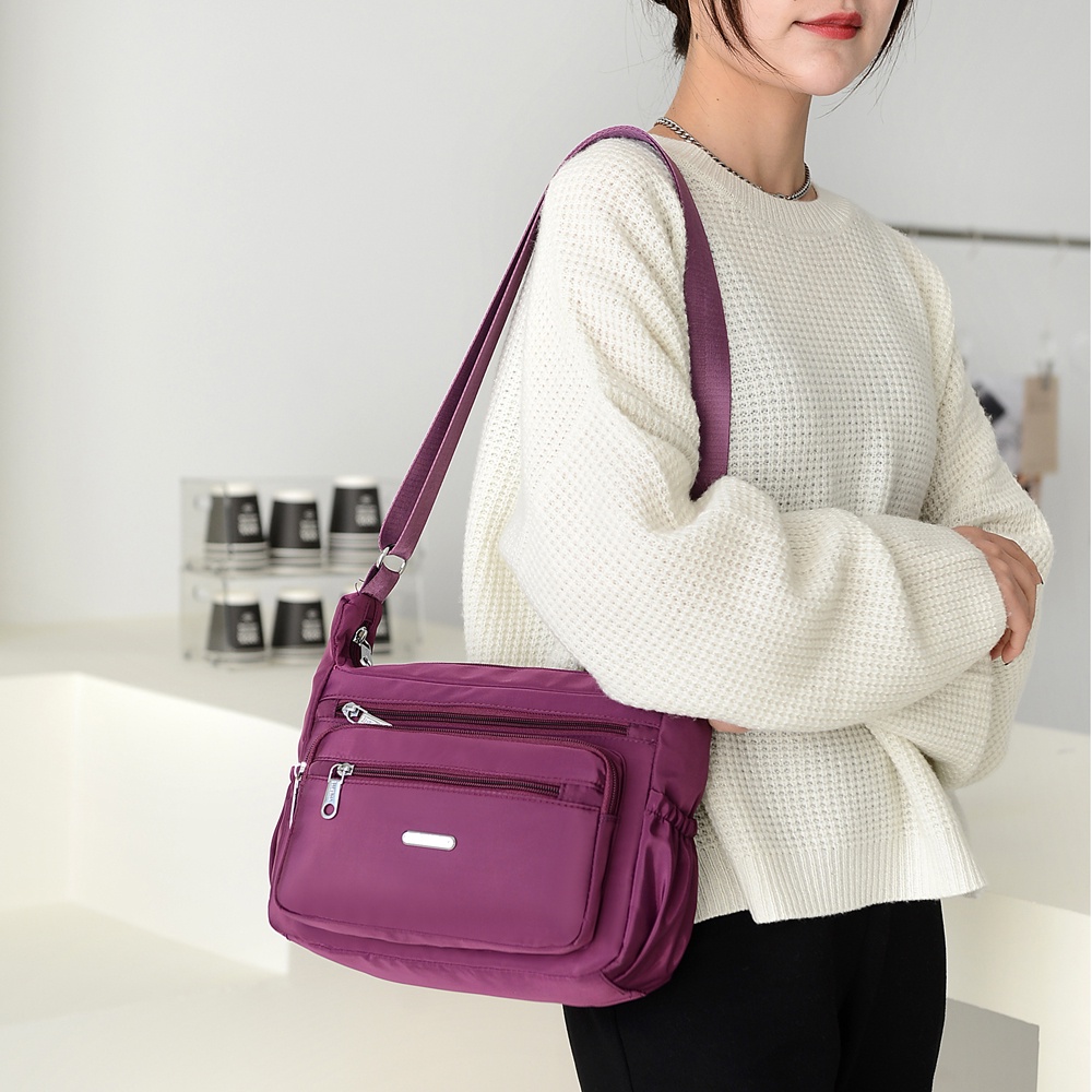 Túi Đeo Chéo Vải Oxford Siêu Nhẹ Nhiều Ngăn Tiện Dụng Cho Nữ