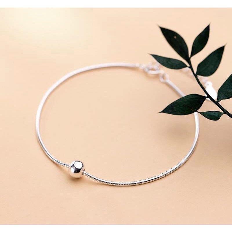 Lắc chân 1 viên bi bạc thật