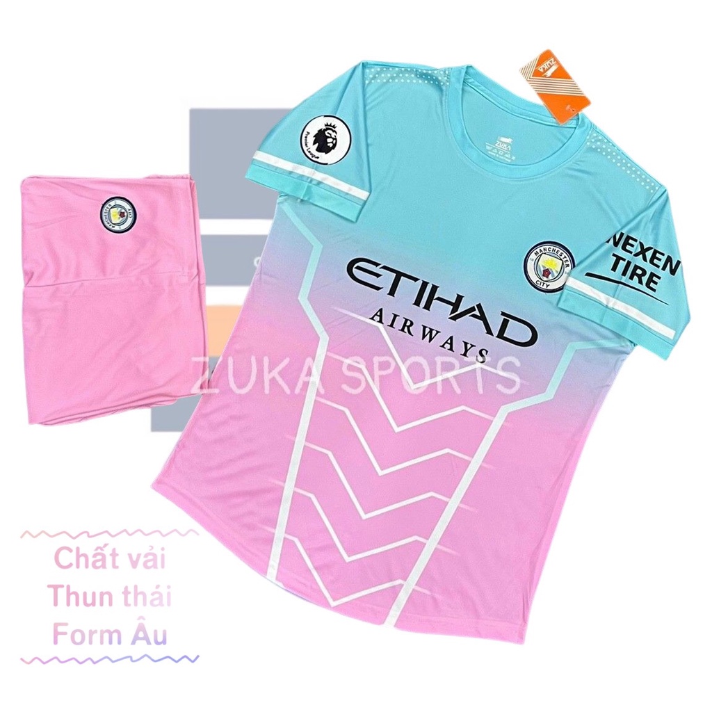 Bộ Quần Áo Bóng Đá Mancity Logo Thêu Xanh Hồng