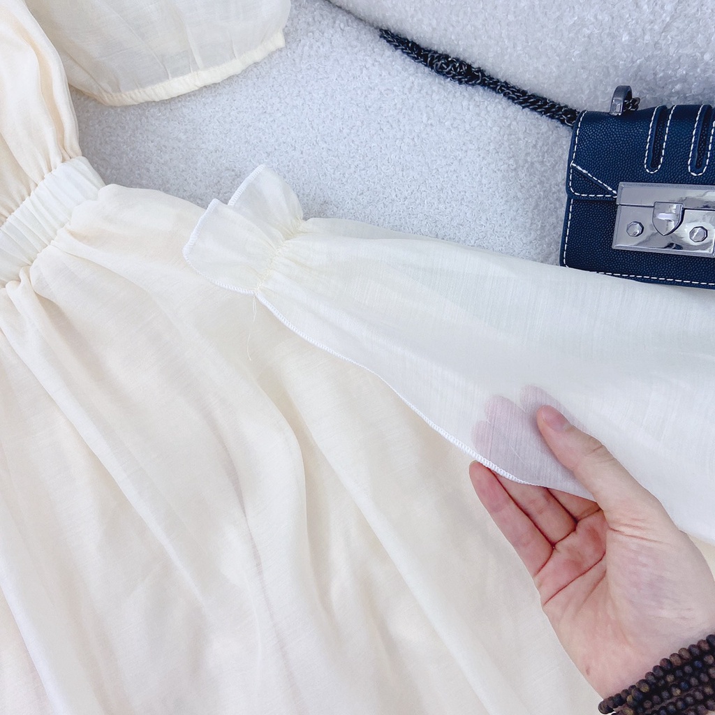 ĐẦM MIDI VOAN KEM CUT OUT NƠ CỘT NƠ LƯNG