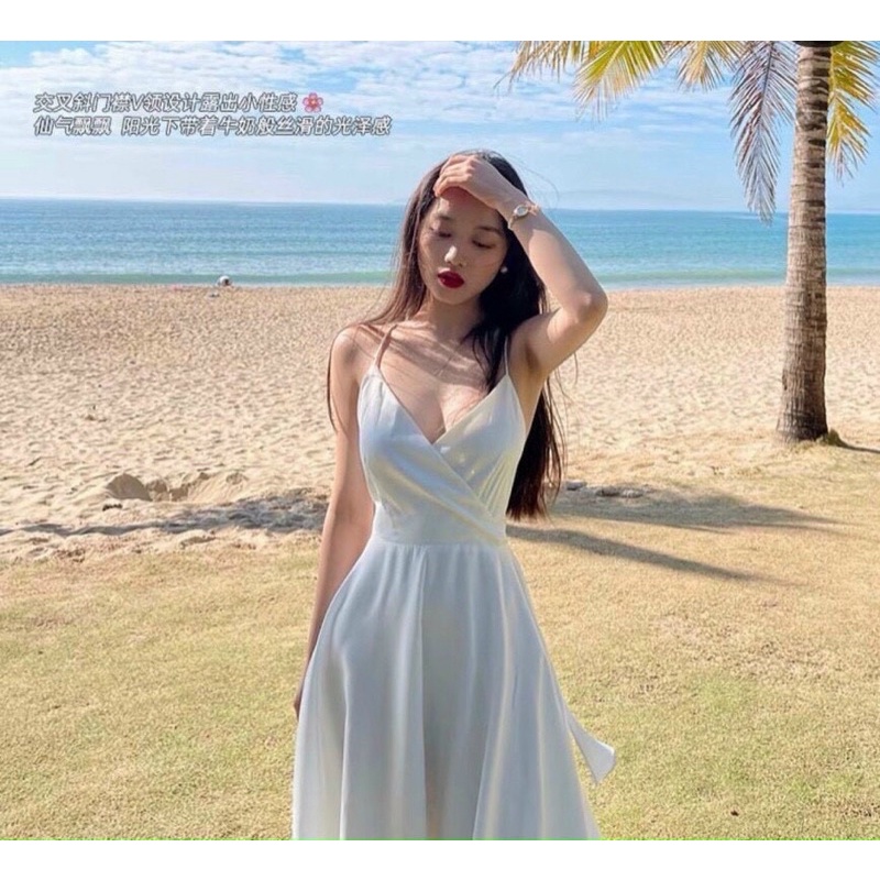 MAXI TRẮNG 2S ĐAN LƯNG THẮT NƠ ĐẮP CHÉO