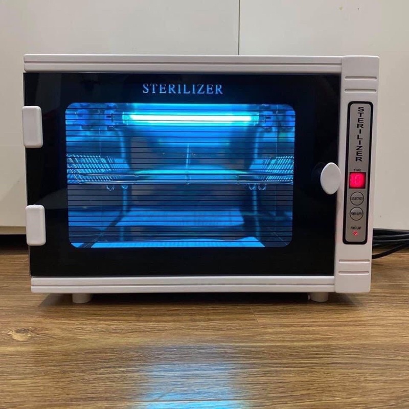 Tủ tiệt trùng dụng cụ tia UV STERILIZER bảo hành chính hãng