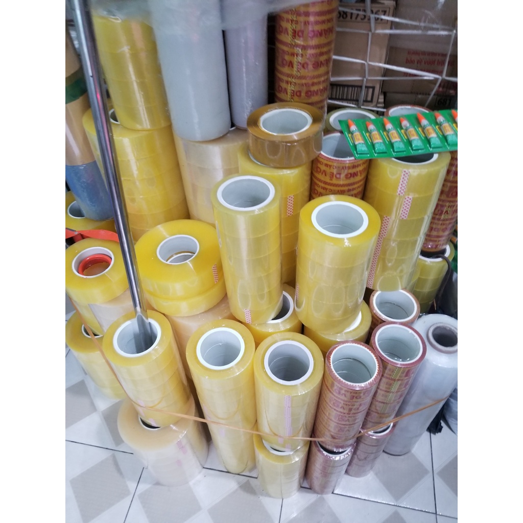 Băng dính loại 1kg 0.5kg lõi nhựa 2.4mm, băng dính đóng hàng, băng dính hàng dễ vỡ xin nhẹ tay