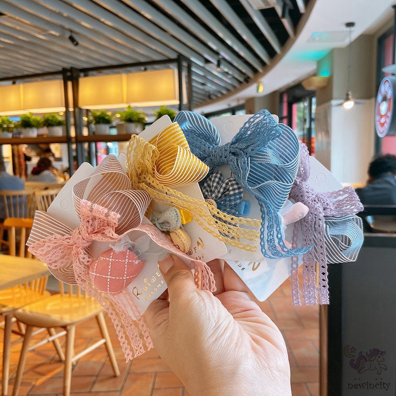 Bộ 2 kẹp tóc đính nơ ren và trang trí nhân vật hoạt hình xinh xắn đáng yêu cho bé gái