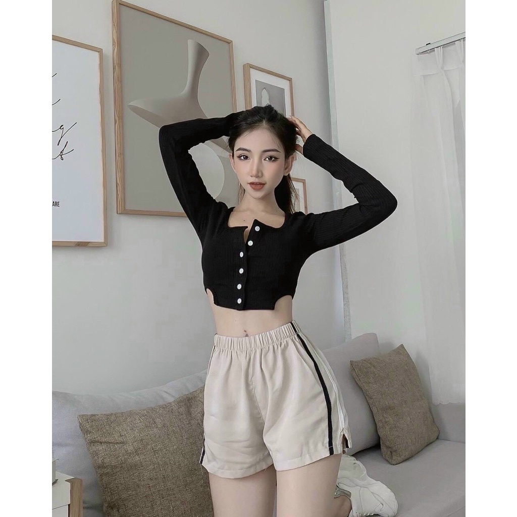 áo thun nữ kiểu tay dài hàng nút hở eo cá tính pc