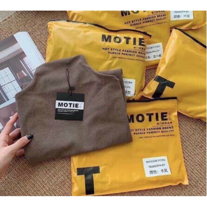 ÁO GIỮ NHIỆT NỮ MOTIE TÚI VÀNG