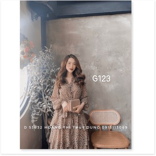 Đầm nữ cổ v gài nút tay dài dáng xòe xếp tầng nhiều lớp da beo g123