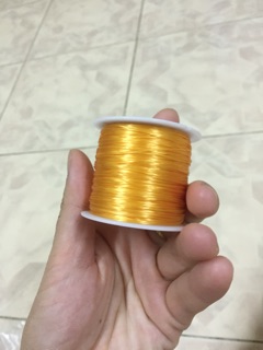 Cuộn cước lụa màu vàng co giãn