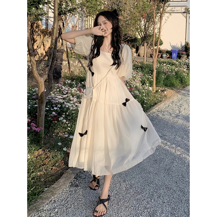 Váy voan tay phồng dập viền xòe dài bồng bềnh công chúa cổ tích đính nơ đen điệu đà