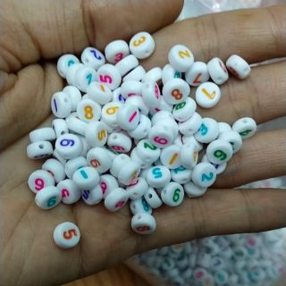 10gram 65 hạt tròn nền trắng in số 4x7mn