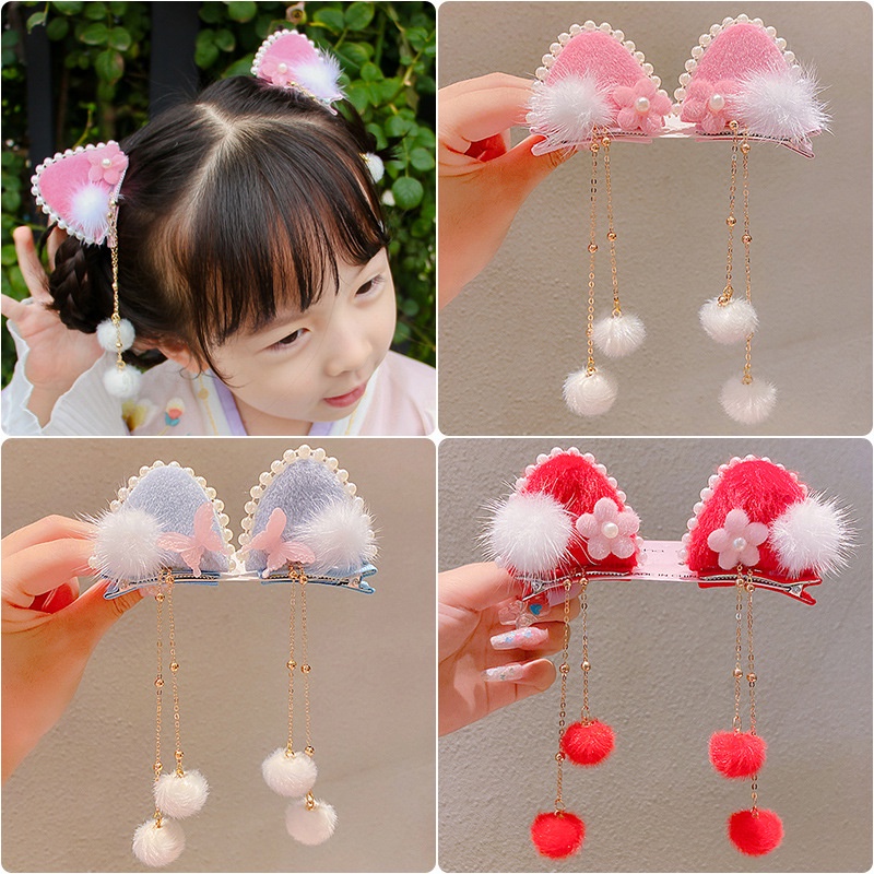 Kẹp tóc hình tai thỏ phối tua rua xinh xắn cho bé gái