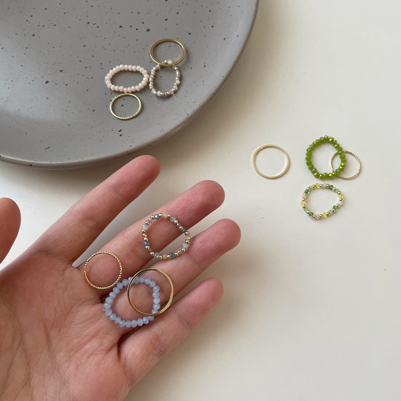 Set 4 nhẫn nữ AY bằng hợp kim mạ vàng/ dạng chuỗi hạt xinh xắn