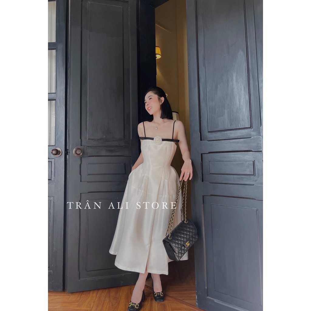 Đầm váy nữ dạ tiệc hai dây kết nơ xẻ tả màu trắng tinh khôi, sang chảnh.
