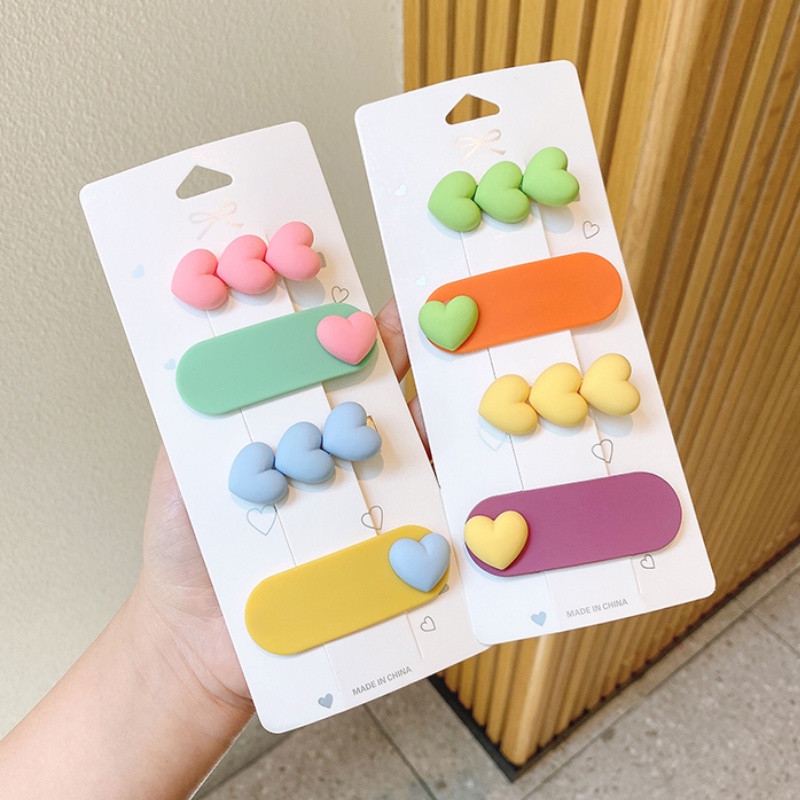 Kẹp tóc nhựa hình trái tim màu sắc đơn giản cho bé