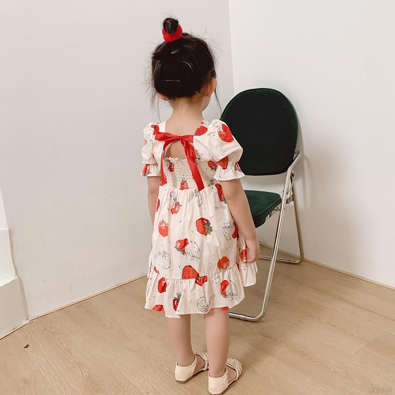 Đầm Tay Phồng Phối Nơ Họa Tiết Dâu Tây Đáng Yêu Cho Bé Gái