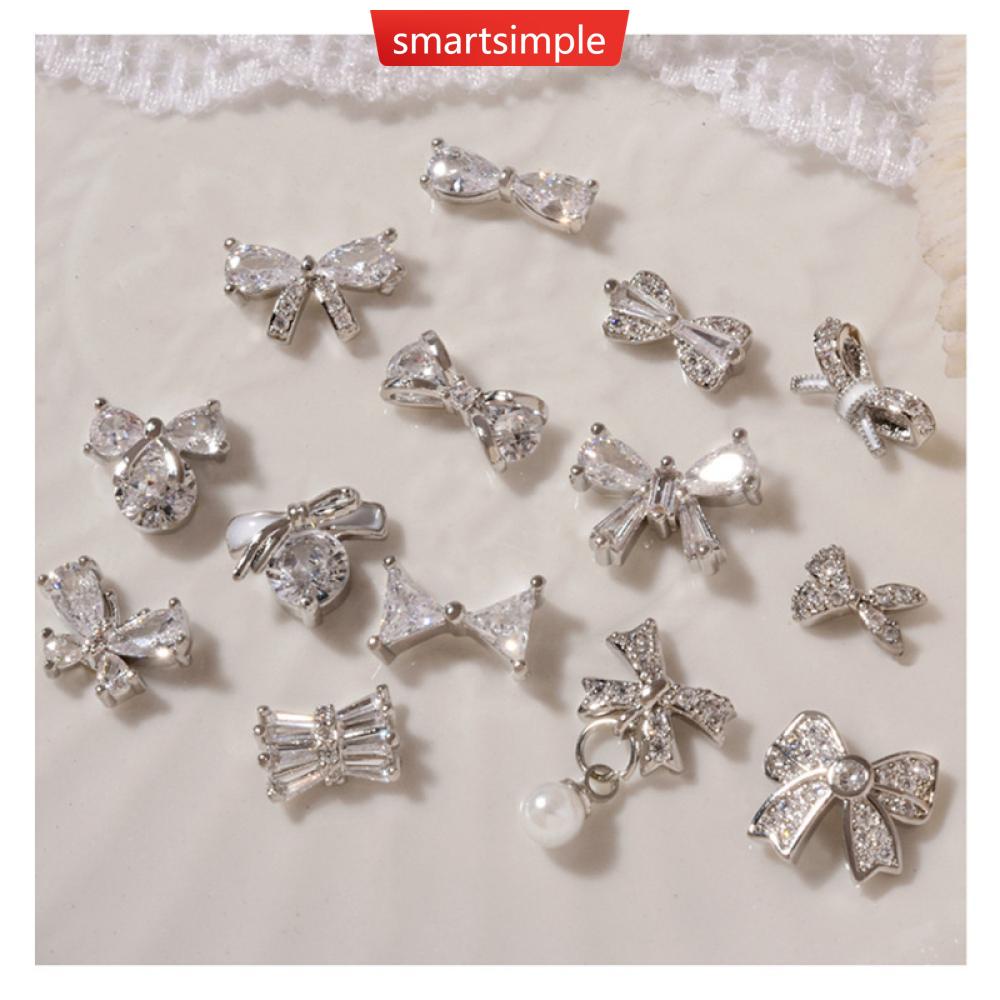 Phụ Kiện Trang Trí Móng Nghệ Thuật Hình Nơ Đính Đá Zircon Màu Bạc Lấp Lánh Thời Trang J4Y3