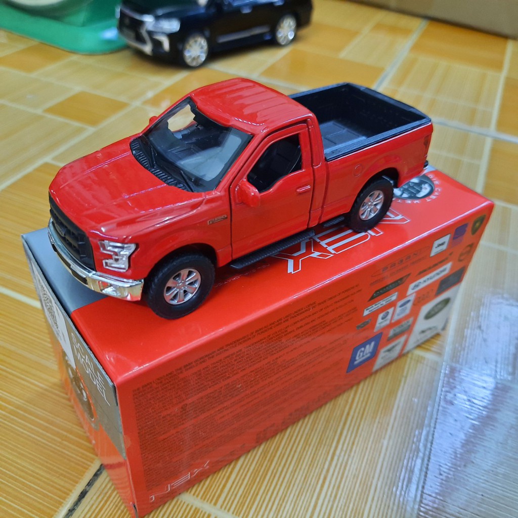 Xe ô tô mini đồ chơi trẻ em mô hình tỉ lệ 1:36 hãng welly mẫu xe Ford F-150 Regular Cab bằng kim loại mở được cửa xe