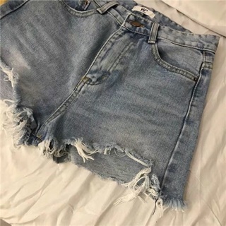 Quần short bò rách gấu